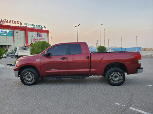 Toyota Tundra 2010  Red LHD Petrol AT Pickup 4WD view 2