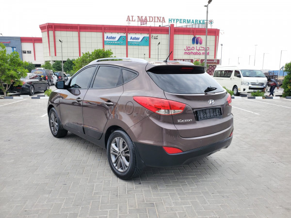 Hyundai Tucson 2014  Bronze LHD Petrol AT SUV 4WD view 8