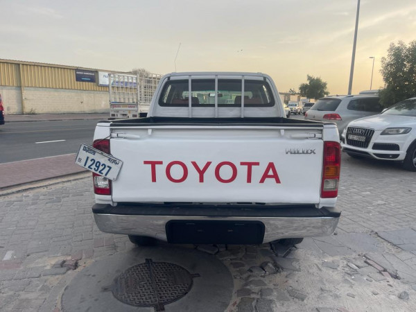 Toyota Hilux 2009  White LHD Petrol MT SUV 4WD view 4