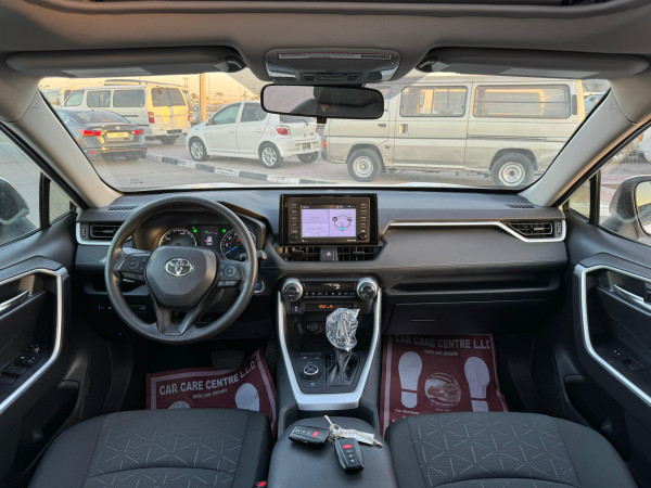 Toyota RAV 4 2021  White LHD Hybrid AT SUV Crossover 4WD view 4