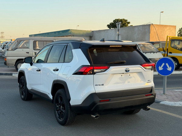 Toyota RAV 4 2021  White LHD Hybrid AT SUV Crossover 4WD view 13