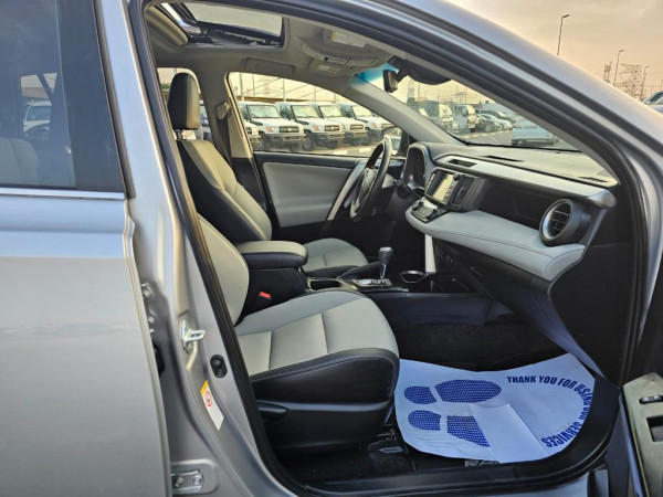 Toyota RAV 4 2017  Silver LHD Hybrid AT SUV Crossover 4WD view 4
