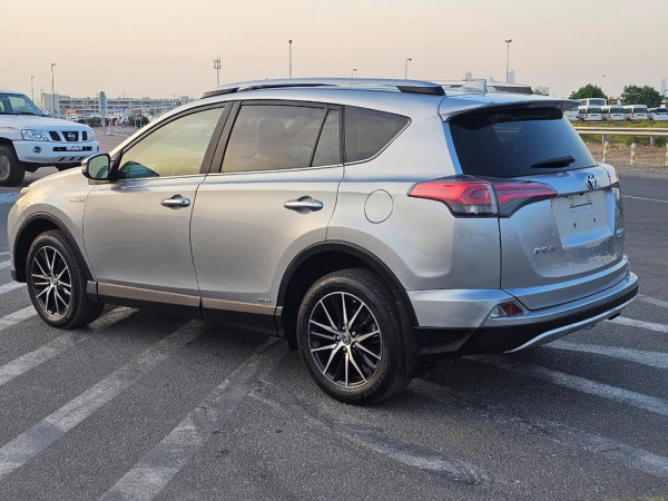 Toyota RAV 4 2017  Silver LHD Hybrid AT SUV Crossover 4WD view 10