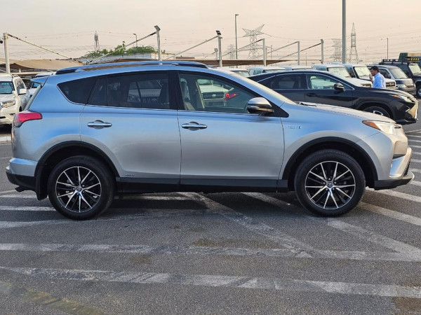Toyota RAV 4 2017  Silver LHD Hybrid AT SUV Crossover 4WD view 12