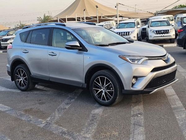 Toyota RAV 4 2017  Silver LHD Hybrid AT SUV Crossover 4WD view 13