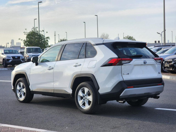 Toyota RAV 4 2019  White LHD Hybrid AT SUV Crossover 2WD view 15