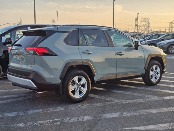 Toyota RAV 4 2019  Green LHD Hybrid AT SUV Crossover 2WD view 14