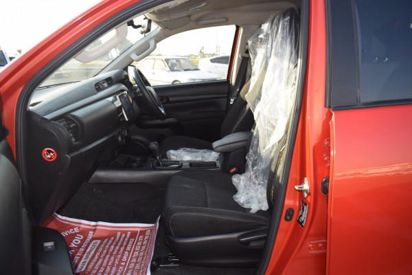 Toyota Hilux 2016  Orange RHD Diesel AT Pickup 4WD view 5