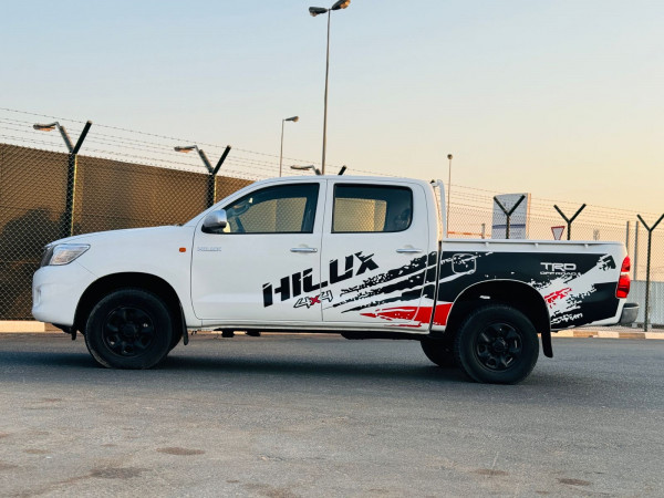 Toyota Hilux 2013  White LHD Diesel MT Pickup 4WD view 5