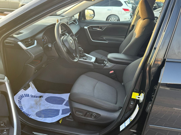 Toyota RAV 4 2021  Black LHD Hybrid AT SUV Crossover 4WD view 4