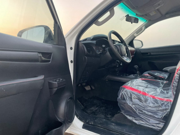 Toyota Hilux 2020/ White LHD Petrol AT Pickup 4WD view 2