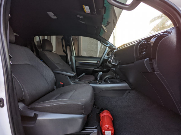 Toyota Hilux 2024  White LHD Petrol AT Pickup 4WD view 2