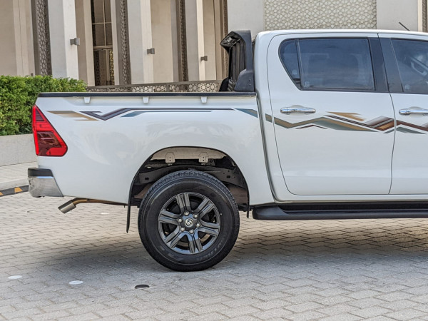 Toyota Hilux 2024  White LHD Petrol AT Pickup 4WD view 2