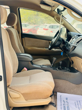 Toyota Fortuner 2012  White LHD Petrol AT SUV 4WD view 2