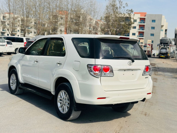 Toyota Fortuner 2012  White LHD Petrol AT SUV 4WD view 3