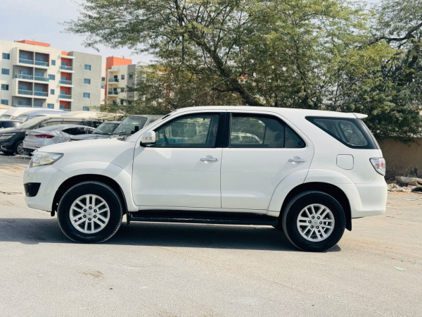 Toyota Fortuner 2012  White LHD Petrol AT SUV 4WD view 5