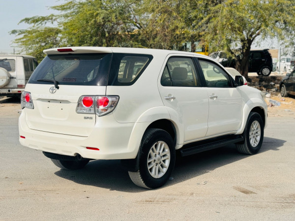 Toyota Fortuner 2012  White LHD Petrol AT SUV 4WD view 6
