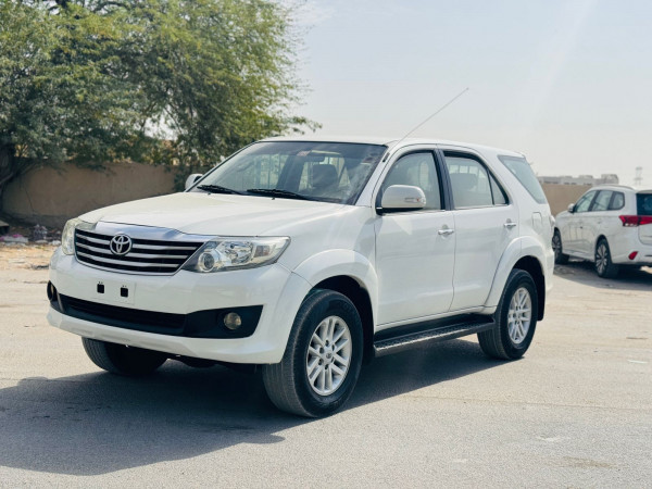 Toyota Fortuner 2012  White LHD Petrol AT SUV 4WD view 8