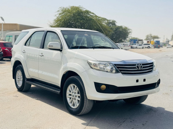 Toyota Fortuner 2012  White LHD Petrol AT SUV 4WD view 11
