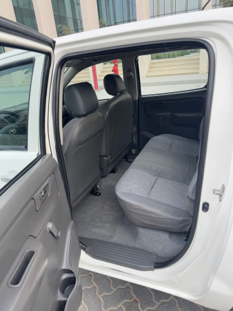 Toyota Hilux 2014/ White LHD Petrol MT Pickup 2WD view 2