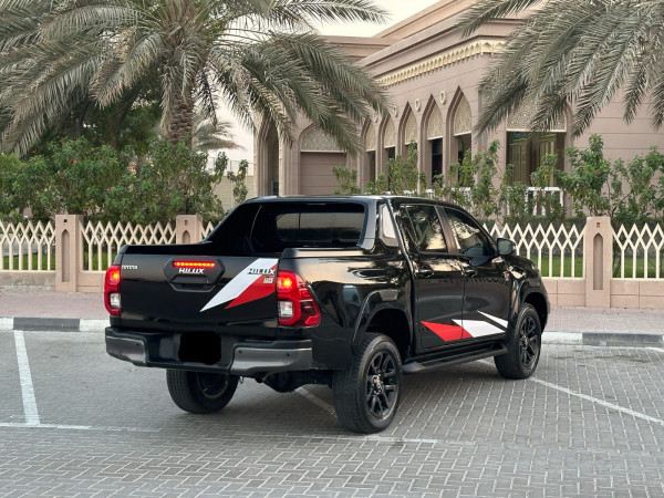 Toyota Hilux 2023  Black LHD Petrol AT Pickup 4WD view 9