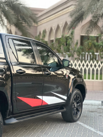Toyota Hilux 2023  Black LHD Petrol AT Pickup 4WD view 13