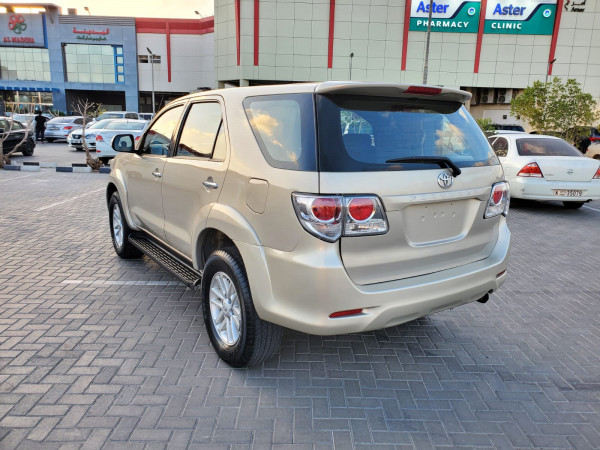 Toyota Fortuner 2012  Gold LHD Petrol AT SUV 4WD view 4