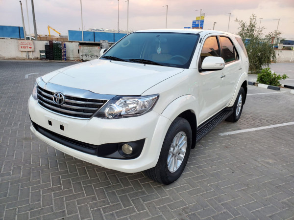 Toyota Fortuner 2012  White LHD Petrol AT SUV 4WD view 4