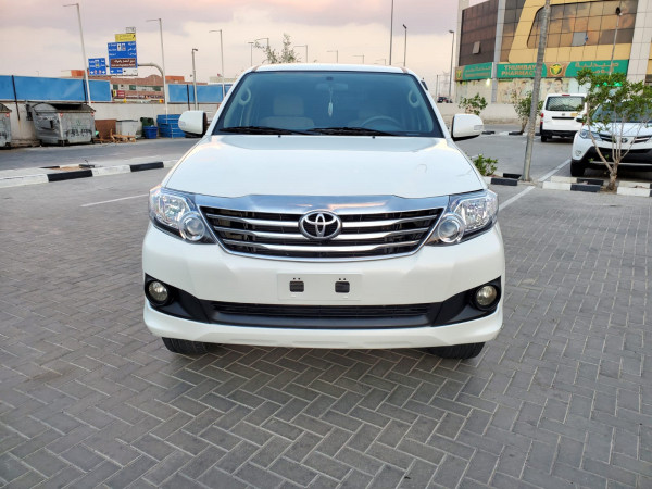 Toyota Fortuner 2012  White LHD Petrol AT SUV 4WD view 5