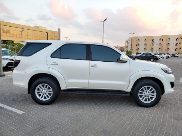 Toyota Fortuner 2012  White LHD Petrol AT SUV 4WD view 6