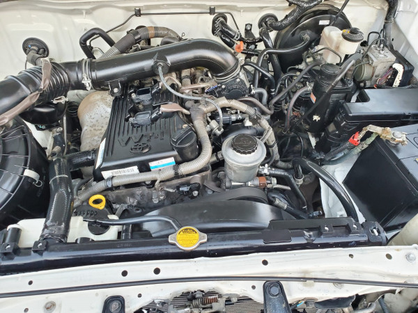 Toyota Fortuner 2012  White LHD Petrol AT SUV 4WD view 7
