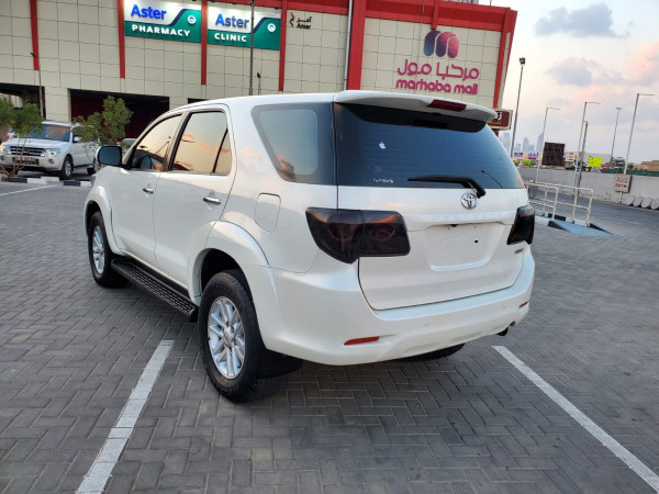 Toyota Fortuner 2012  White LHD Petrol AT SUV 4WD view 8