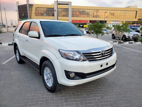 Toyota Fortuner 2012  White LHD Petrol AT SUV 4WD view 9