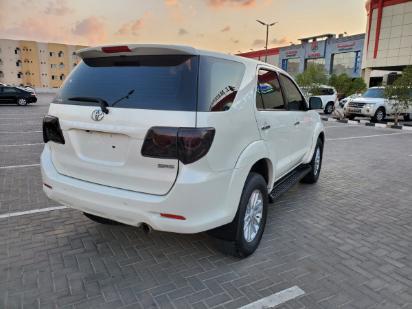 Toyota Fortuner 2012  White LHD Petrol AT SUV 4WD view 10