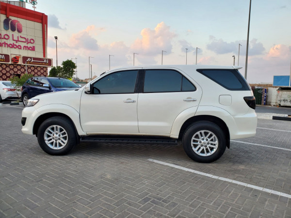 Toyota Fortuner 2012  White LHD Petrol AT SUV 4WD view 11